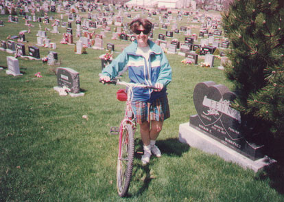 cherylonbikeincemetary.jpg 46.1K
